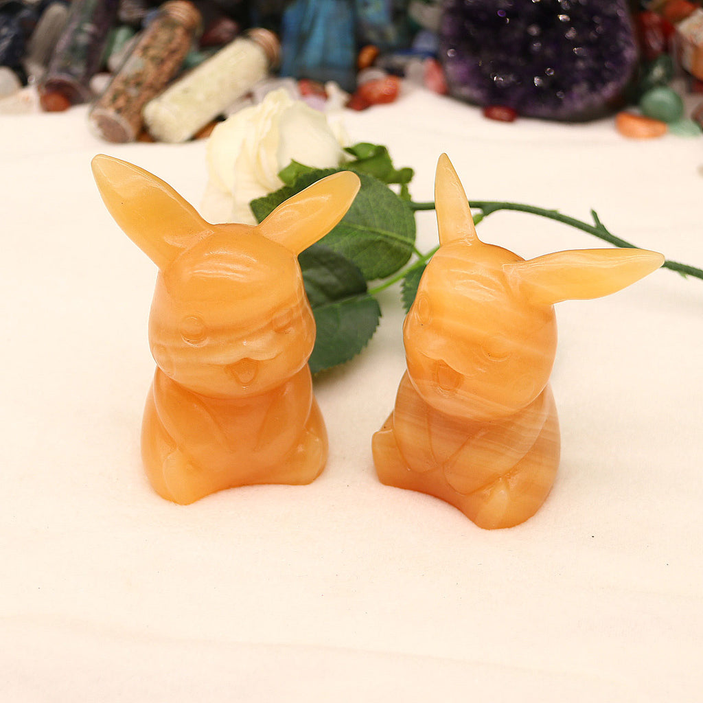 Natural yellow calcite Pikachu carving pieces original stone carving pieces ornaments