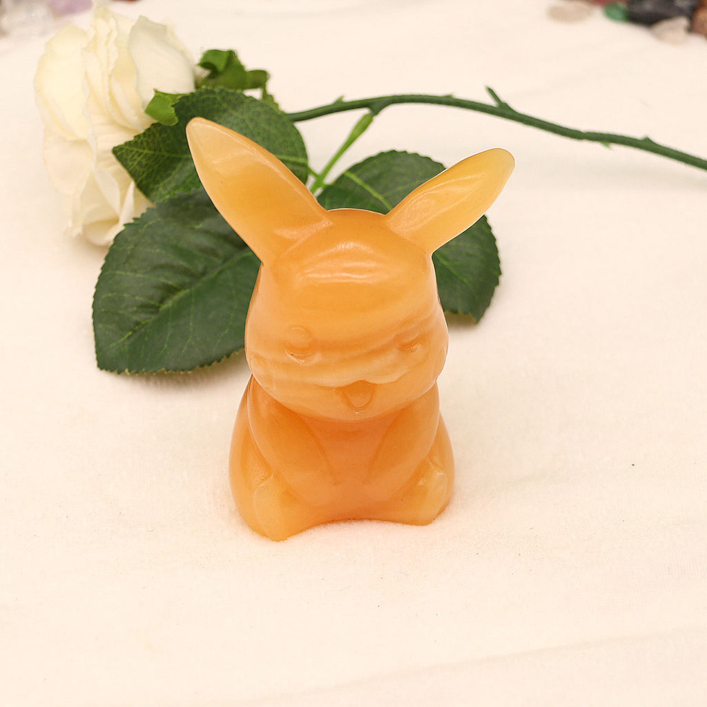 Natural yellow calcite Pikachu carving pieces original stone carving pieces ornaments