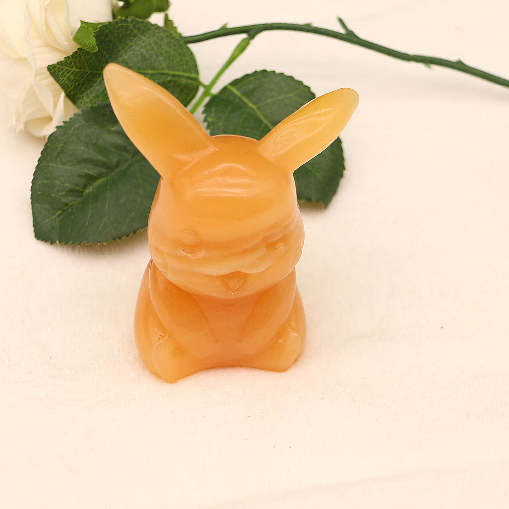 Natural yellow calcite Pikachu carving pieces original stone carving pieces ornaments